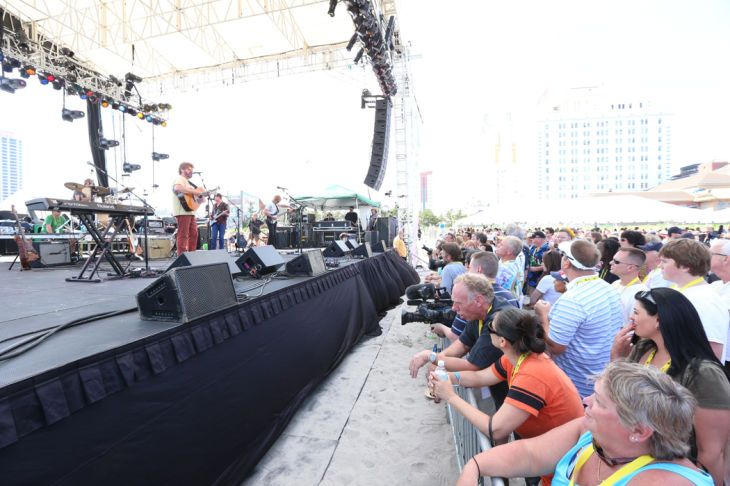 Mac McAnally performs on stage at a free concert held on the beach in front Resorts Maragaritaville in Atlantic City with special guest Jimmy Buffet