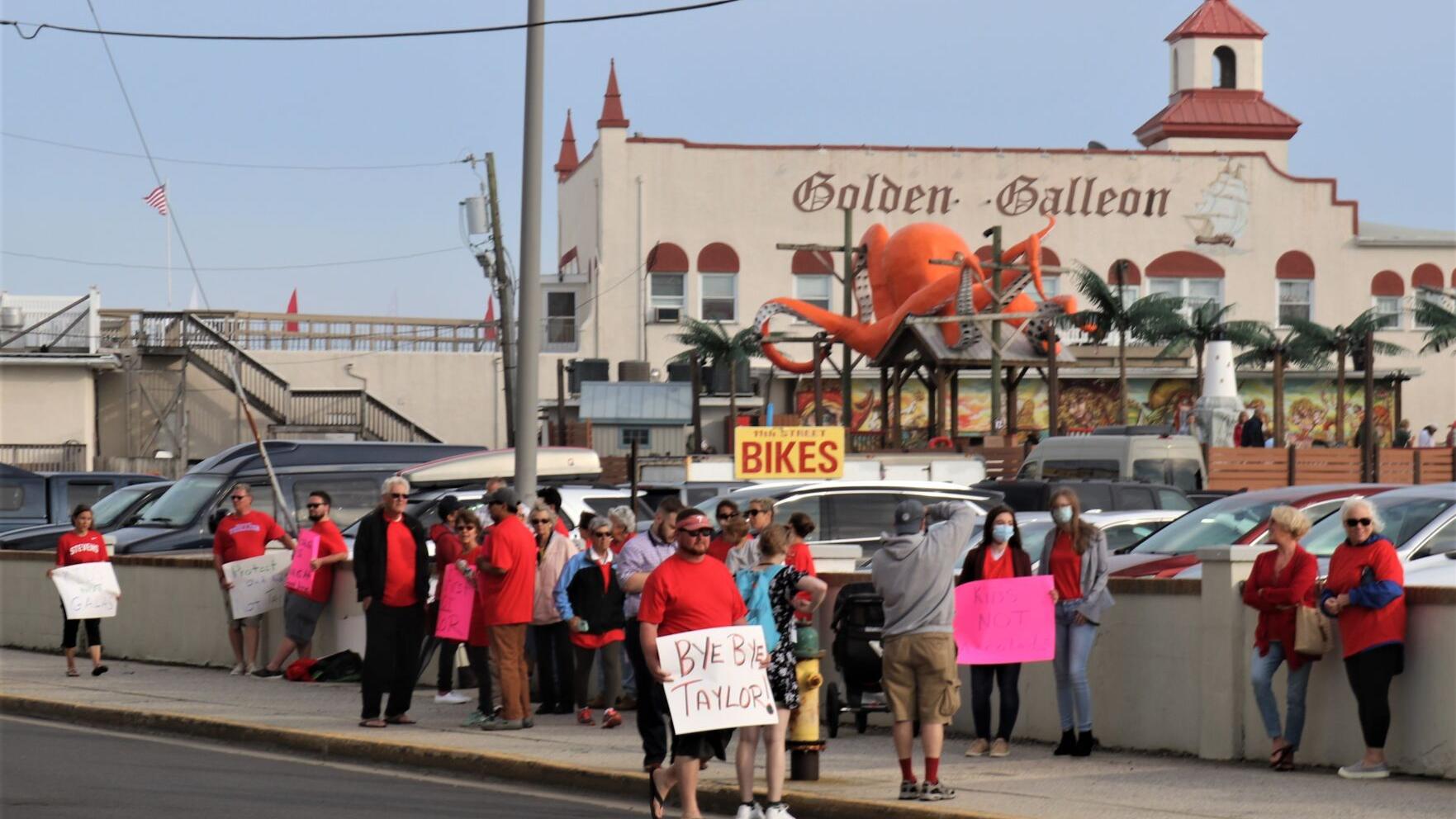 As Ocean City celebrates outgoing superintendent, protesters have their say