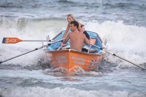 Brigantine lifeguards Matt Dolan, Favuve Haney, Joe Savell, and Molly Hoffman at the Atlantic City Lifeguard Classic