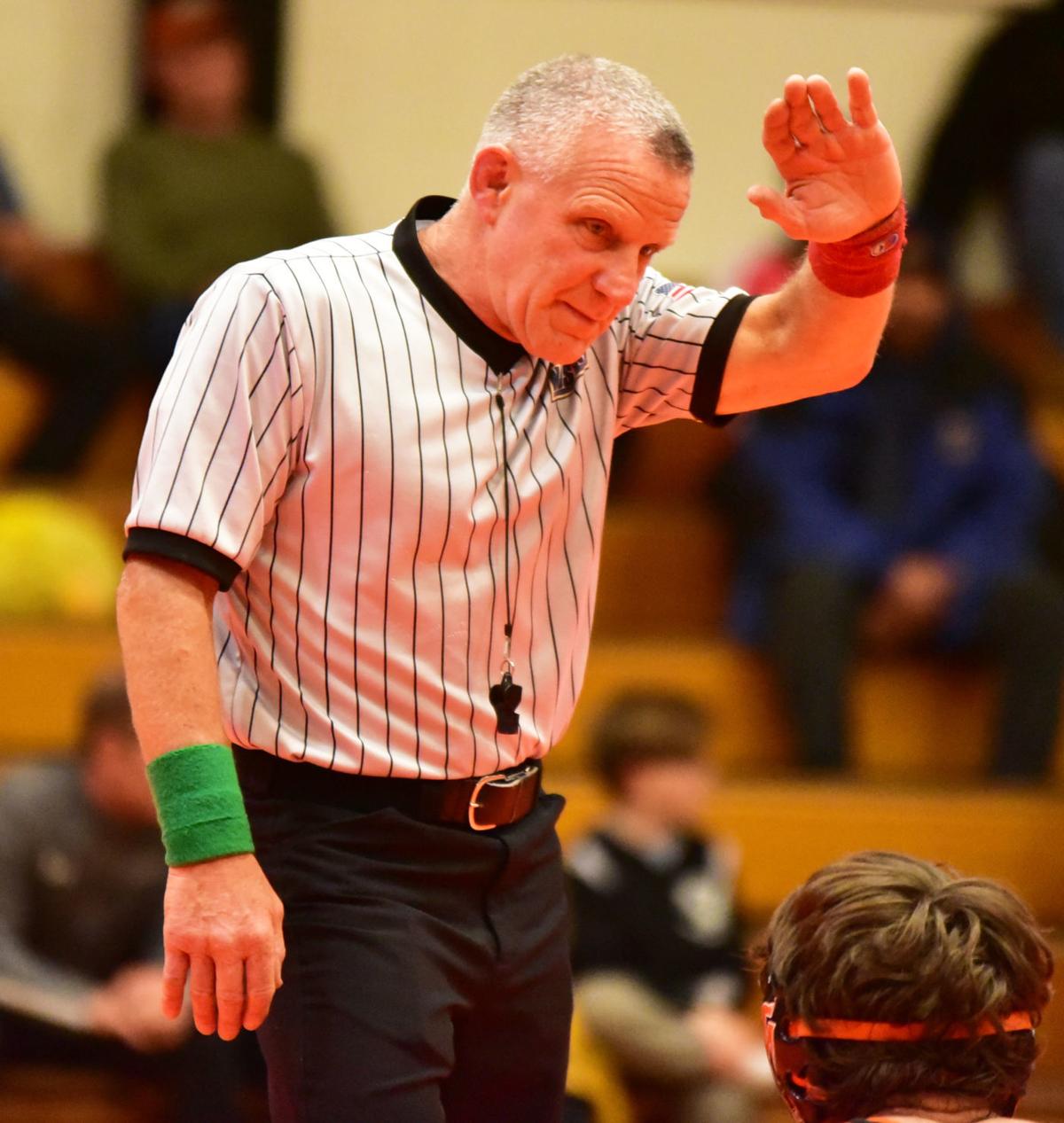 Former EHT wrestling coach now on the other side of the mat as referee
