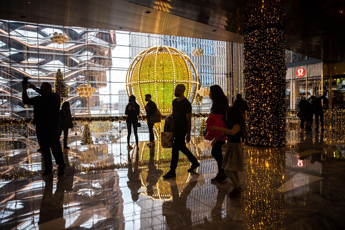Shoppers wearing protective masks are seen at Hudson Yards on Nov. 27, 2020 in New York, United States.