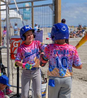 Players competing during the MudHen Beach Baseball Tournament on Rio Grande Avenue beach in Wildwood
