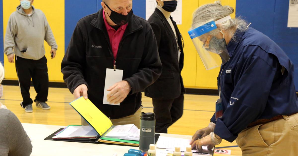 Governor to issue executive order raising poll workers' pay Governor to issue executive order raising poll workers' pay