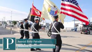 Families and children participating in the annual Wildwood Baby Parade on the Wildwood Boardwalk during summer 2026.
