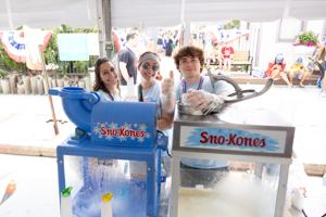 Volunteers serving snow cones at Lucy the Elephant's 145th birthday celebration in Margate
