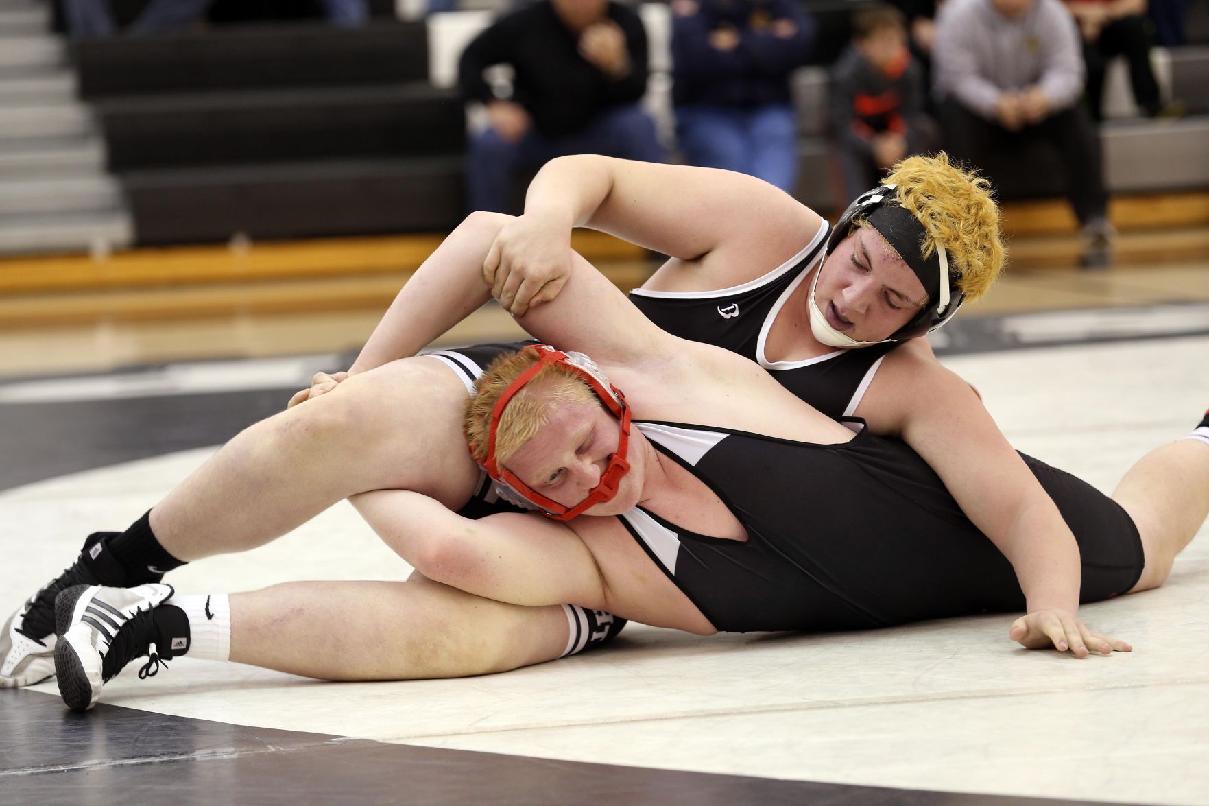 high school wrestlers in singlets