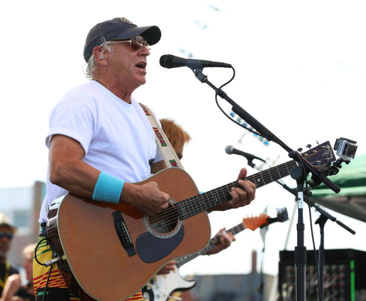 Mac McAnally performs on stage at a free concert held on the beach in front Resorts Maragaritaville in Atlantic City with special guest Jimmy Buffet
