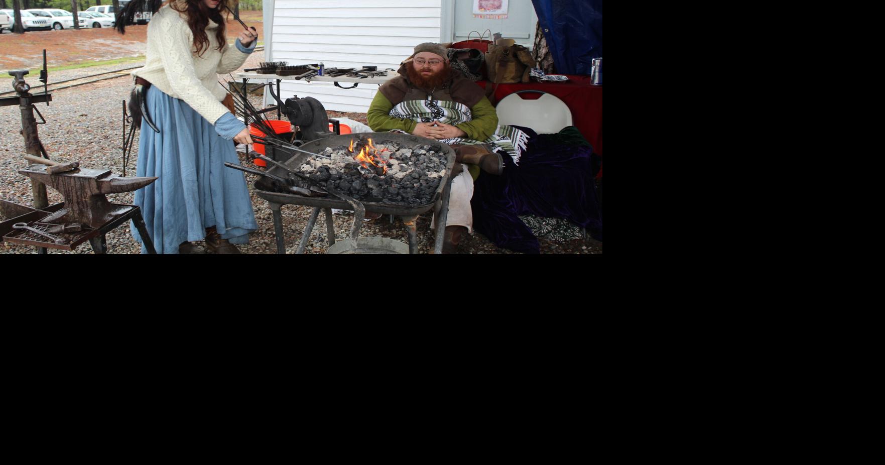 Renaissance Faire endures rainy Sunday at Historic Smithville Village