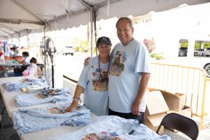 Volunteers Suzan and Barry Imber at the t-shirt table during Lucy the Elephant's 145th birthday celebration in Margate