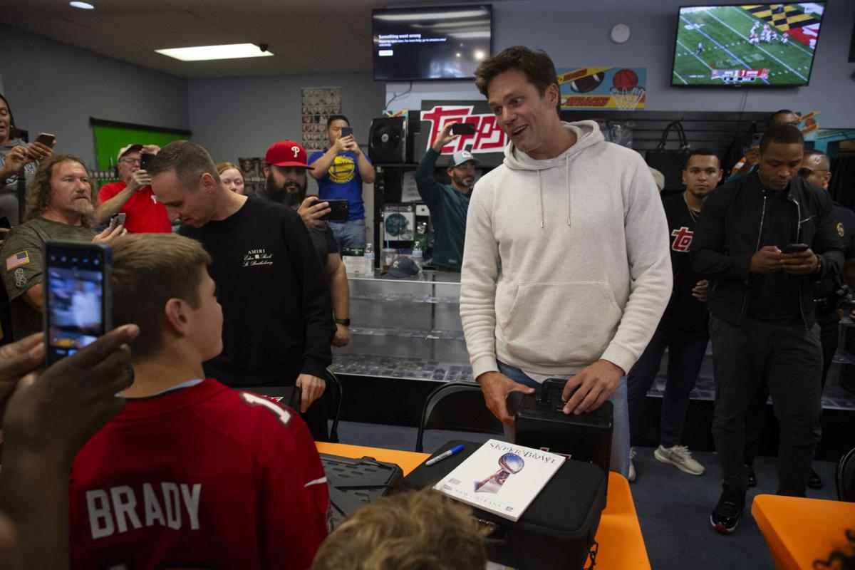 Tom Brady And Travis Scott Surprise Fans At Trading Card Event