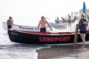 Lifeguards competing in the Chief Rod Aluise Atlantic City Lifeguard Classic on Albany Avenue beach