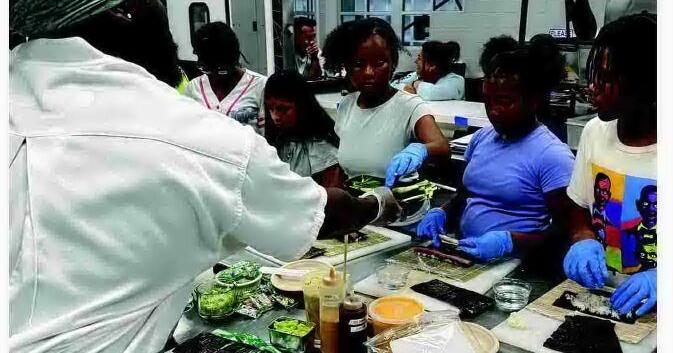 Hard Rock chef teaches AC children how to make sushi