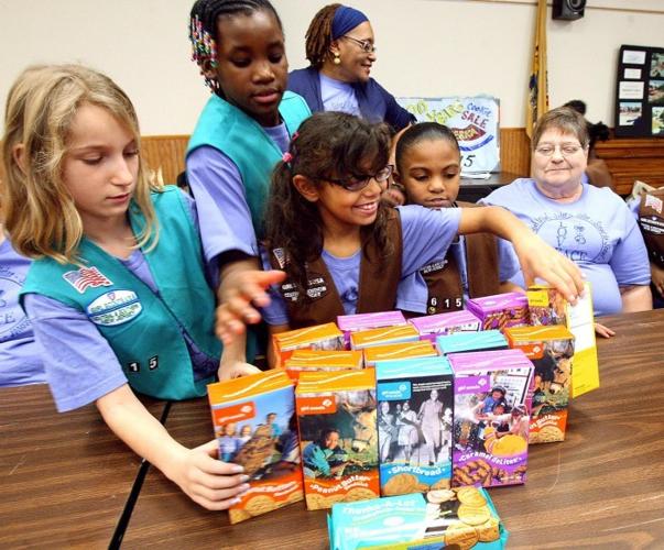 The Plus Side Volunteers play the role of moms for Girl Scout troop in