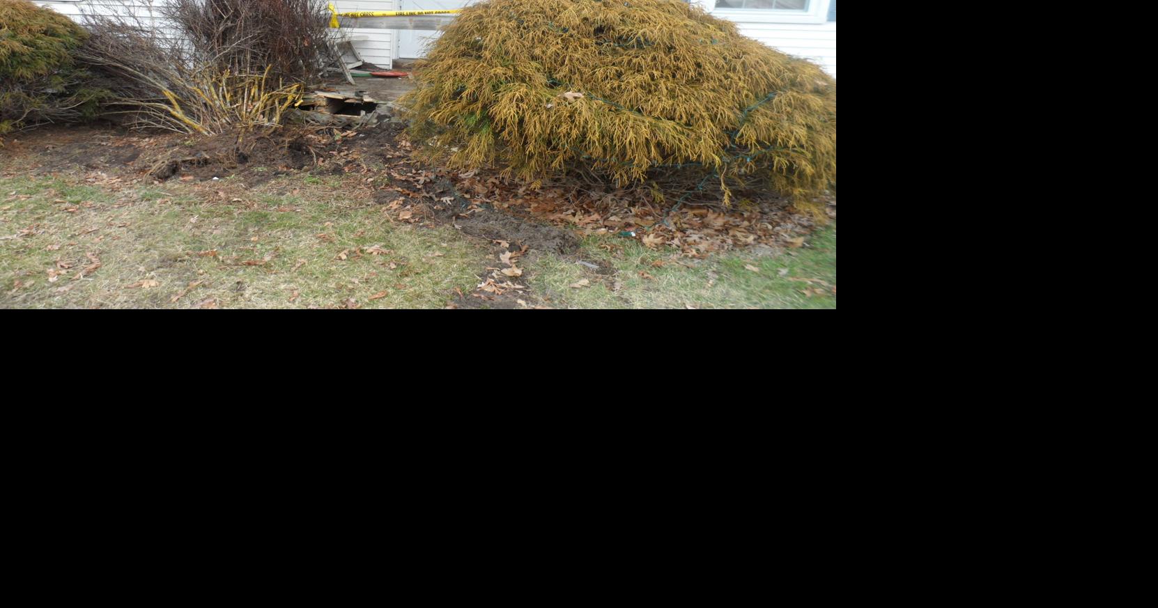 Mays Landing crash damages home, parked car