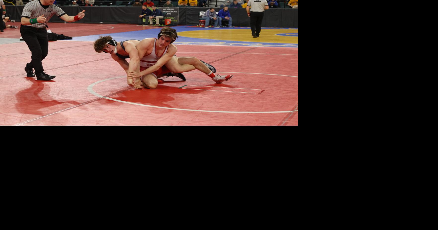 GALLERY Opening day of the state high school wrestling tournament at