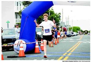 Ocean City, New Jersey running event participants enjoying the Jersey Shore during evening festivities