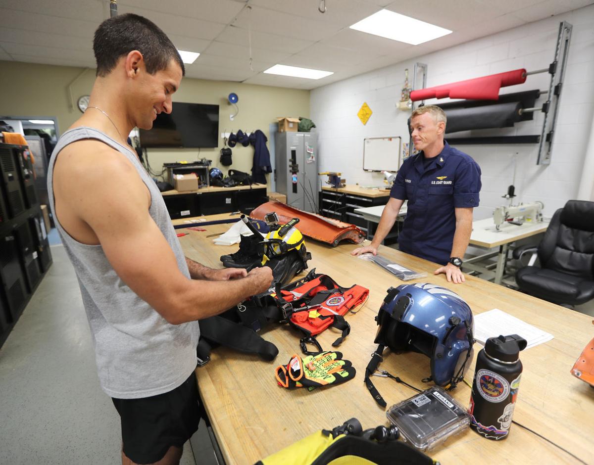 U.S. Coast Guard rescue swimmers act as paramedics in the water