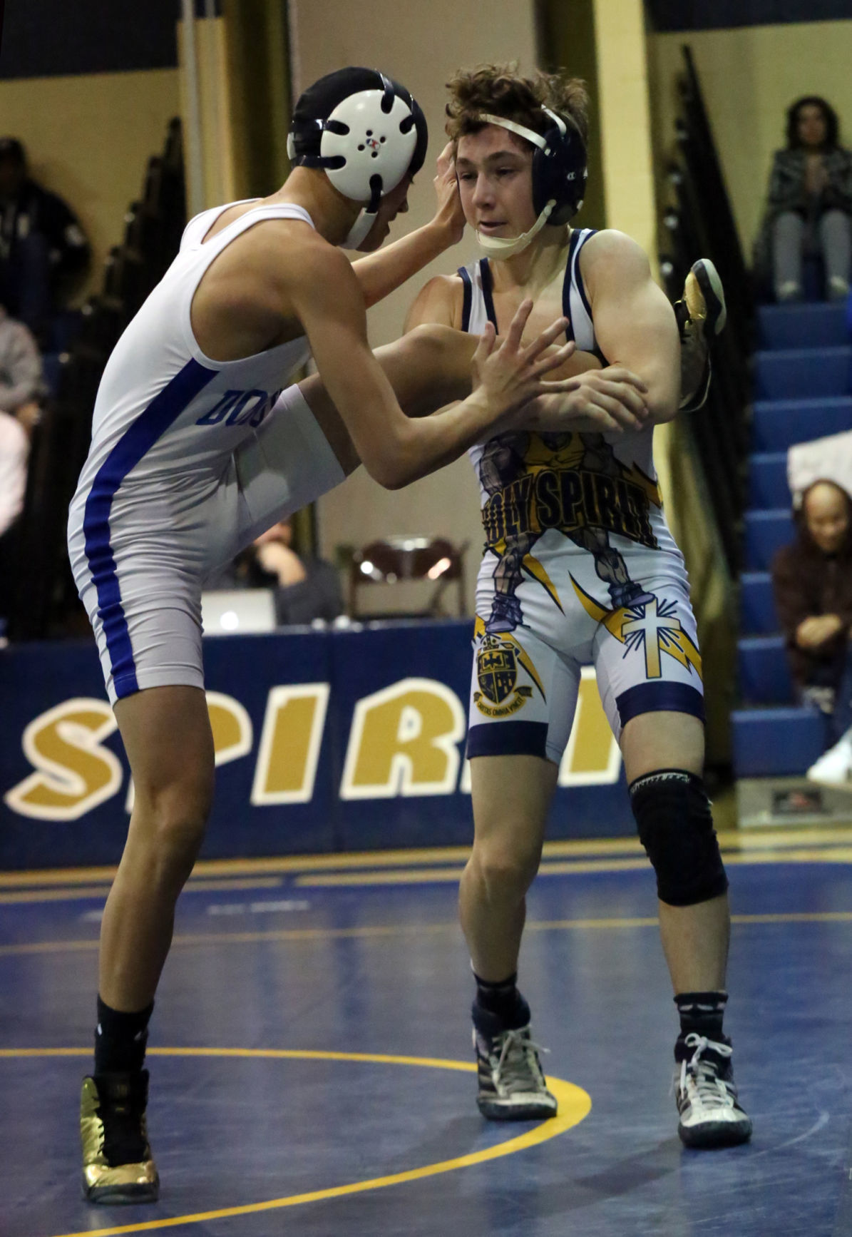 Driscoll's late rally sends Holy Spirit wrestling to fourth straight