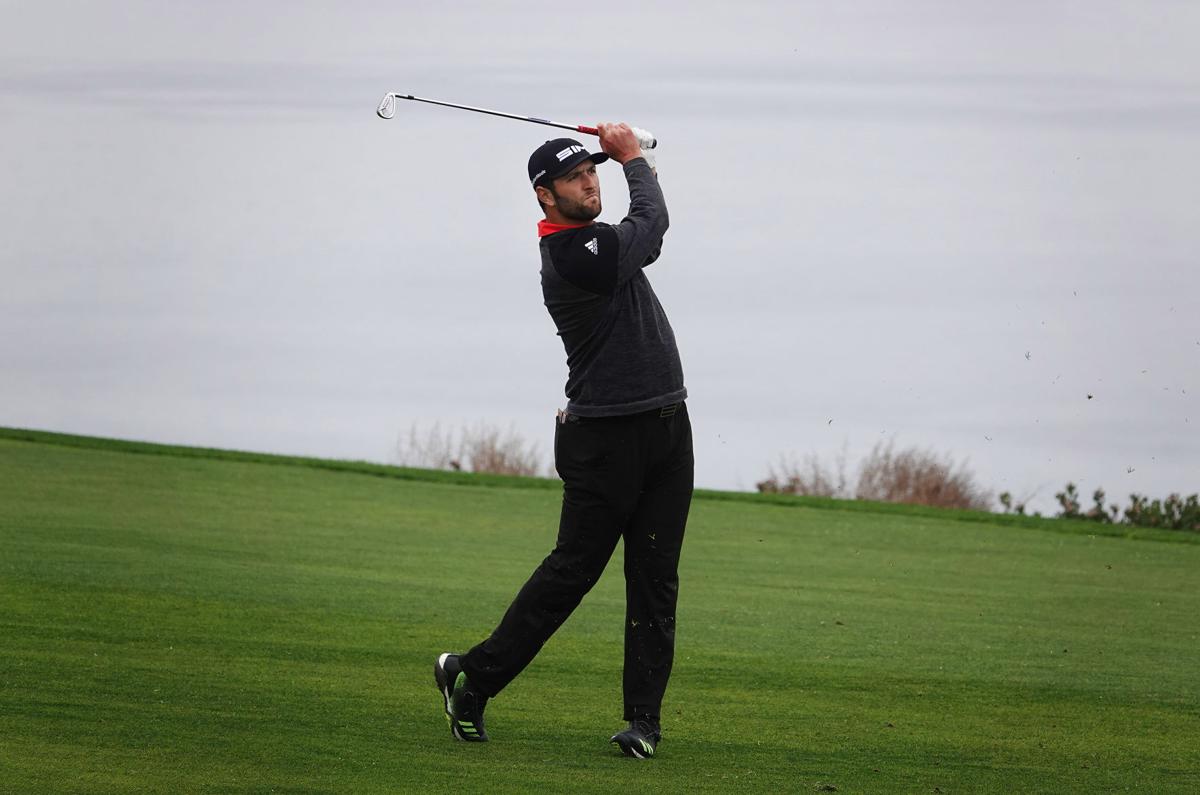 Jon Rahm hits on the 4th hole during the Farmers Insurance Open at the Torrey Pines Golf Course in San Diego on January 26, 2020.