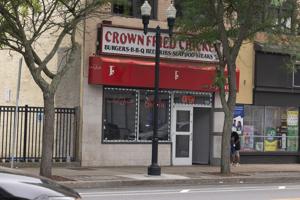 Crown Fried Chicken storefront on Atlantic Avenue in Atlantic City, one of the halal food options serving the community