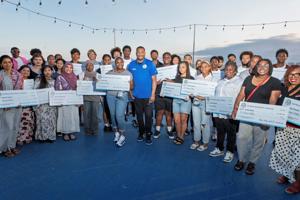 Atlantic City Mayor Marty Small Sr. celebrates with winners of his namesake scholarship at Steel Pier