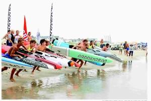 Lifeguards competing in water during the U.S. Lifesaving Association Mid-Atlantic Regionals in Ocean City, New Jersey