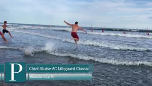 Lifeguards competing in the Chief Rod Aluise Atlantic City Lifeguard Classic on Albany Avenue beach