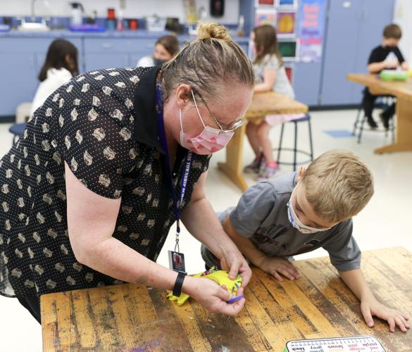 Kindergartners make dog toys for shelter dogs for World Kindness Day