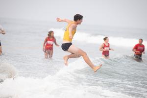 Scenes from lifeguards competing at the Beschen-Callahan Memorial Lifeguard Races in North Wildwood, New Jersey