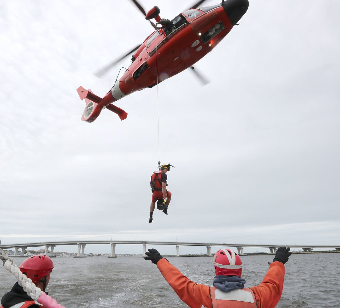 U.S. Coast Guard Rescue Swimmers Act As Paramedics In The Water ...