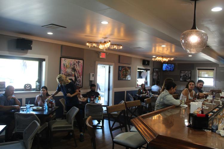 weather, busy afternoon greet establishments on 1st day of