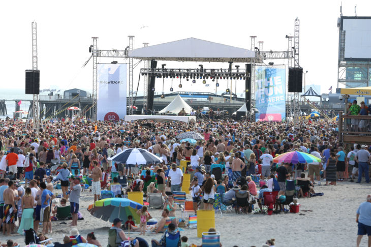 Mac McAnally performs on stage at a free concert held on the beach in front Resorts Maragaritaville in Atlantic City with special guest Jimmy Buffet