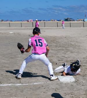 Players competing in the MudHen Beach Baseball Tournament on Rio Grande Avenue beach in Wildwood