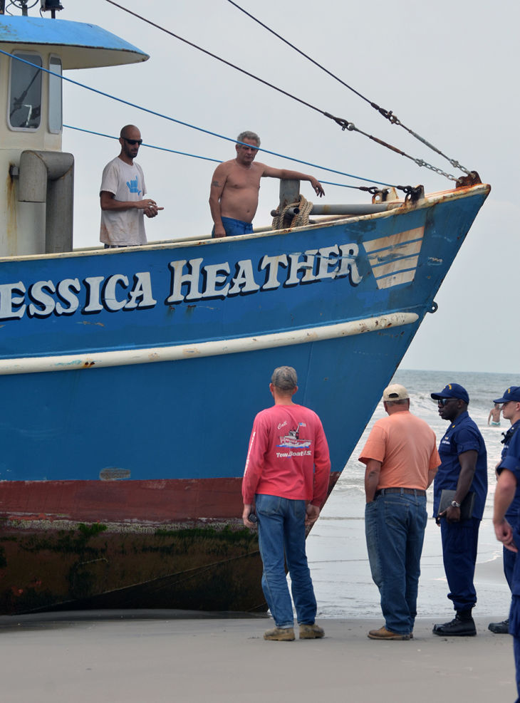 Fishing vessel runs aground