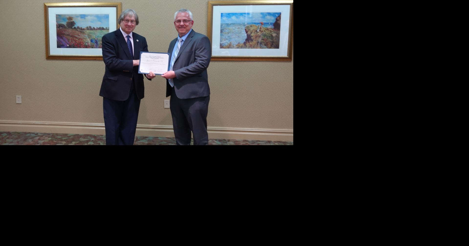 Pacanowski earns government certification designation