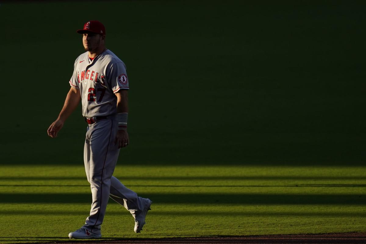 August 1, 2017: Los Angeles Angels center fielder Mike Trout (27) shows his  new haircut as he chats with an umpire during a review timeout in the game  between the Philadelphia Phillies