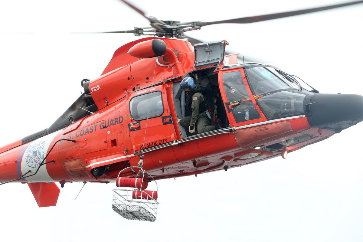 U.S. Coast Guard rescue swimmers act as paramedics in the water
