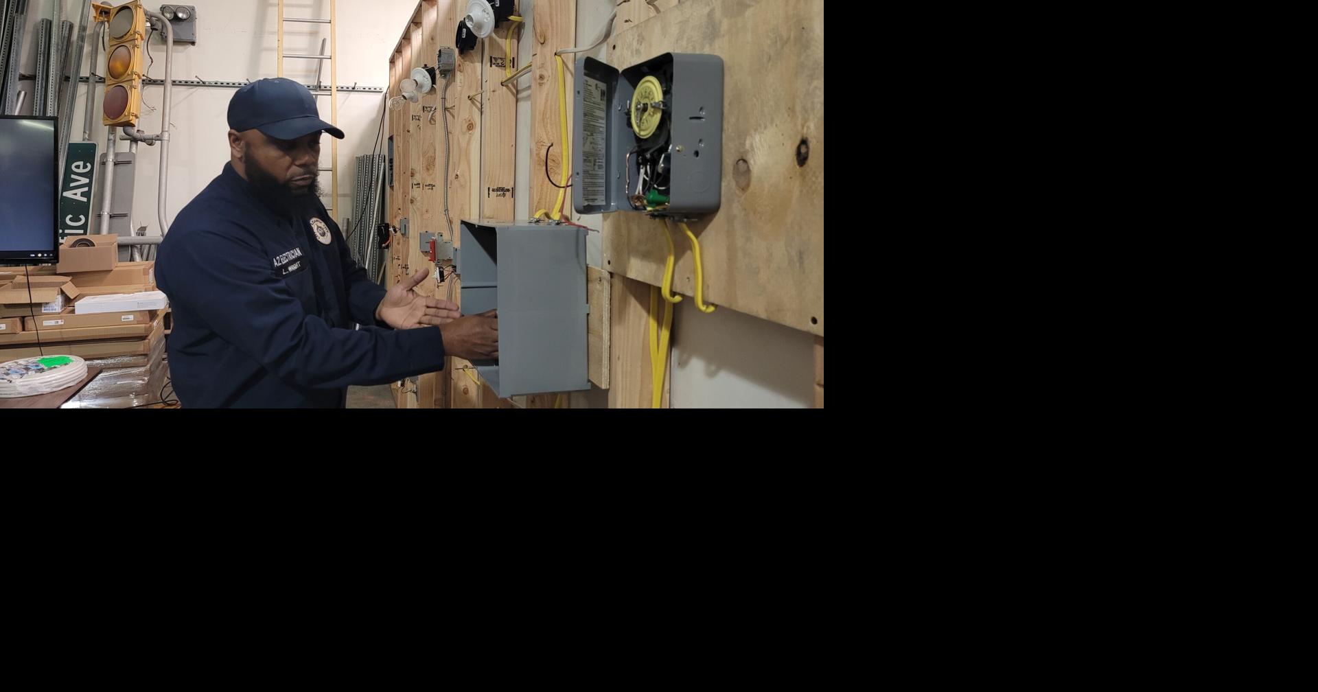 AC public works employees complete electrician program