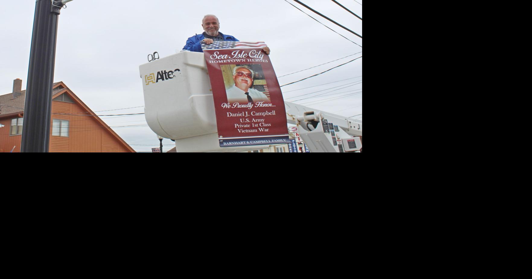 Sea Isle City mayor helps hang banners honoring veterans
