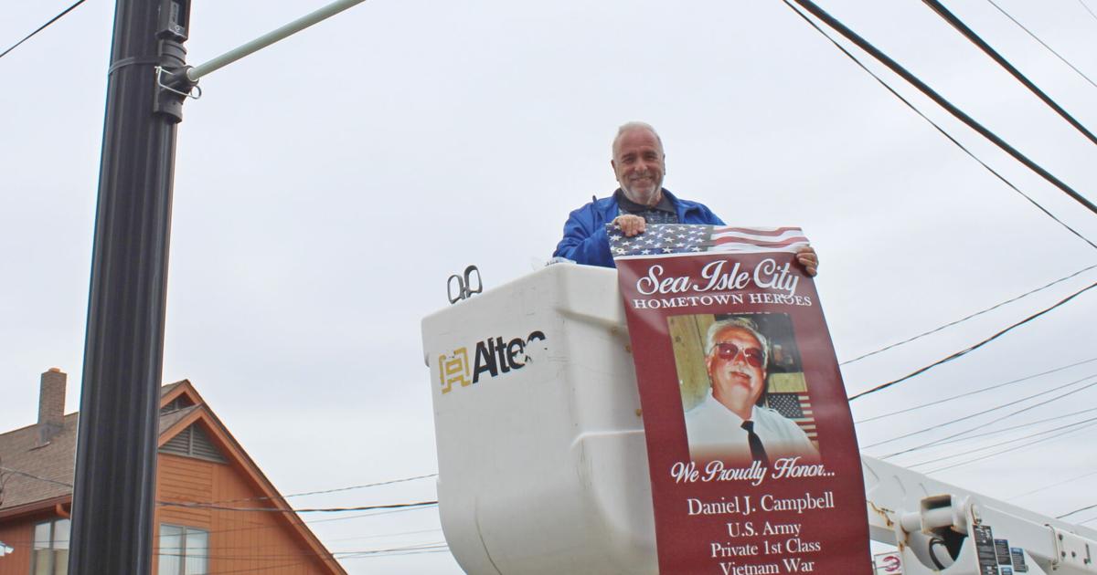 Sea Isle City mayor helps hang banners honoring veterans