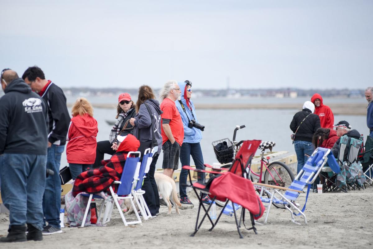 Family and friends gather to watch the First Annual Back Bay Challenge between Mainland and Ocean City’s Boys Crew held at the Dr. John W. Holland Boathouse and along the mile stretch on Harvard Ave. in Ventnor. Dave Griffin / for the Press