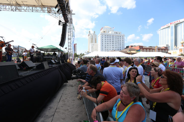 Mac McAnally performs on stage at a free concert held on the beach in front Resorts Maragaritaville in Atlantic City with special guest Jimmy Buffet