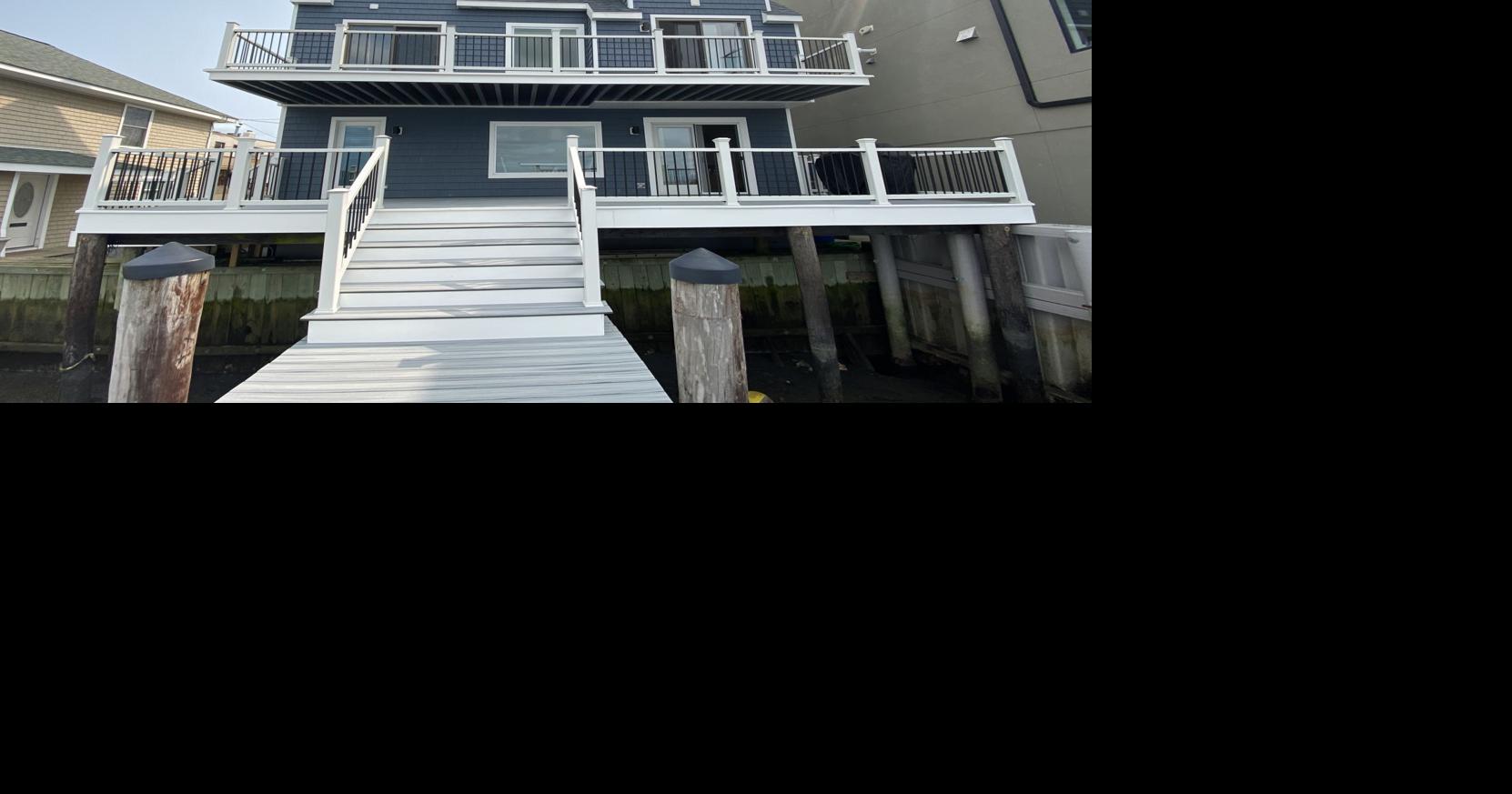 Two boat slips and three floors of new furniture are included with this