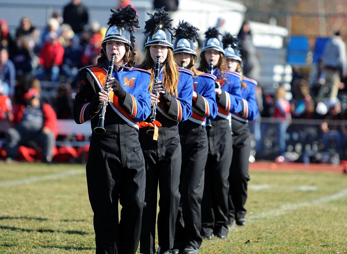 The Millville High School Band performs during the Millville