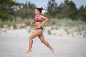 Female lifeguards competing in the Cape May Point Women's Lifeguard Challenge event