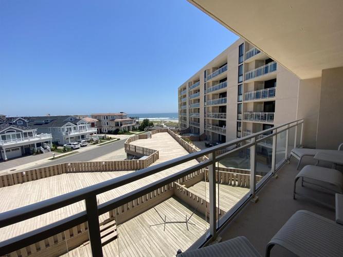 Amenities abound in twobedroom, twobathroom oceanfront condo located