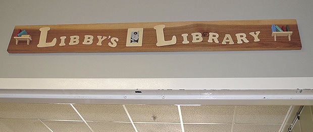 Library named for longtime senior volunteer | News | presspubs.com