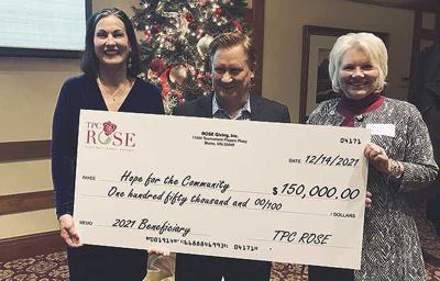 TPC ROSE presents $150,000 to Hope for the Community