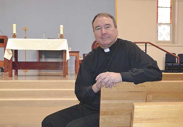 Father Ralph Talbot Sigh of relief as church debt paid in full | News | presspubs.com