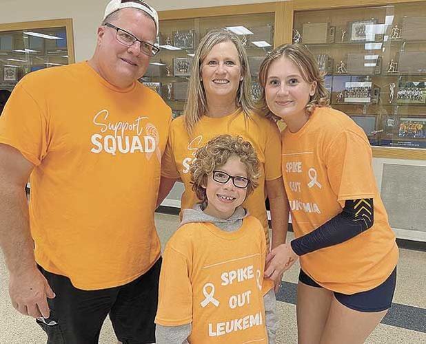 Mahtomedi volleyball team paints the gym orange to ‘spike out’ leukemia